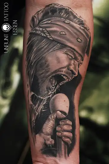 axl rose tattoo portrait porträt guns n' roses tattoo unterarm mann